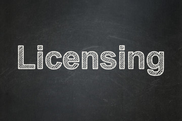 Obraz premium Law concept: Licensing on chalkboard background