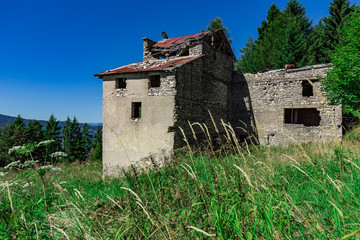 An Abandoned Farm House In The Hills