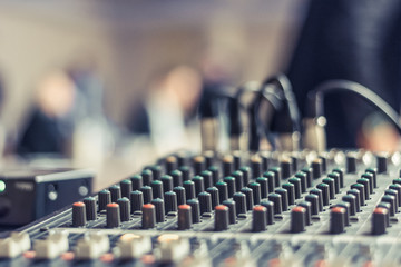 Audio mixer in conference room.