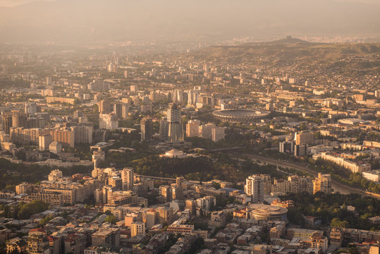 Cityscape of modern Tbilisi on a sunset © ilyaska