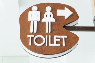 Toilet sign black and yellow plate with Thai word mean toilet