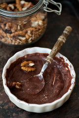 Chocolate souffle with walnuts and cocoa powder