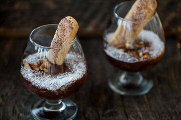 Chocolate souffle with coconut flakes in a glass
