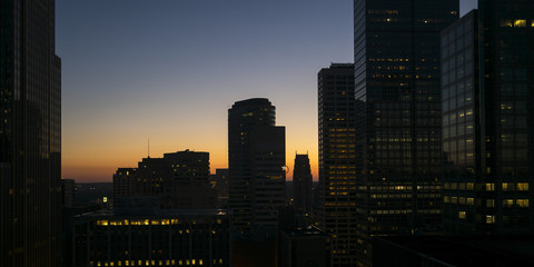 Fototapeta na wymiar Modern office buildings at dusk in Downtown Minneapolis, Hennepin County, Minnesota, USA