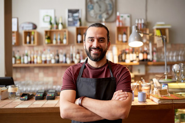 happy man, barman or waiter at bar