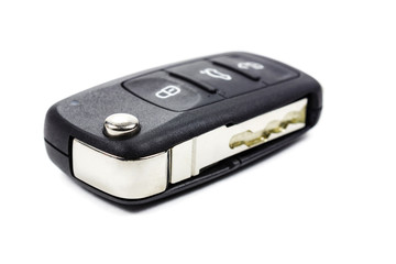 Closed ignition key on a white background