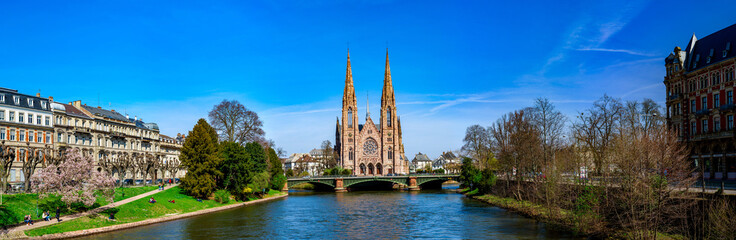 Panoramic view of beautiful church in Strasbourg from the river side