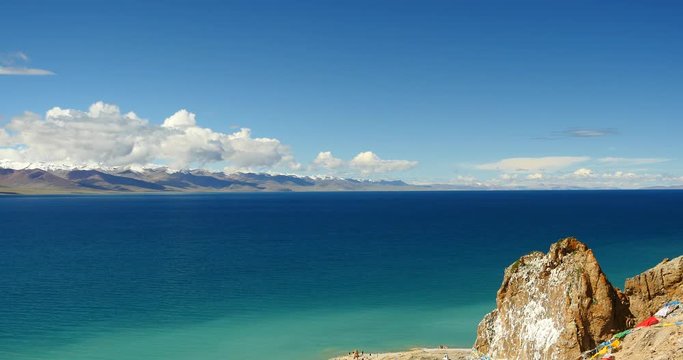 4k huge clouds mass rolling over lake namtso & Tanggula snow mountain peak,tibet mansarovar,Tibet's second largest lake,is the third largest saltwater lake in China.