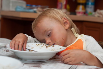 Young girl sleeping after lunch