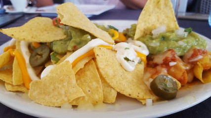 Cheesy nachos with guacamole