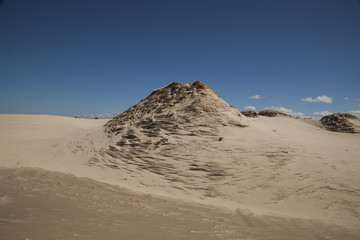 Sand, dunes and blue sky