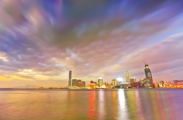 Victoria Harbor and Hong Kong skyline at sunset