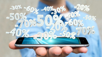 Businessman holding sales icons over phone 3D rendering