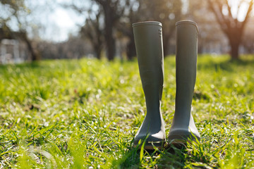 Wellingtons standing on green lawn