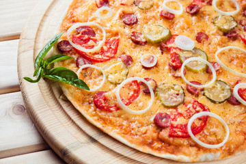 Assorted Pizza on the wooden background