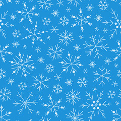 Christmas seamless doodle pattern with snowflakes