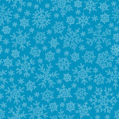 Christmas seamless doodle pattern with snowflakes