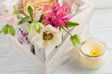 Naklejka na ściany i meble Wooden box with poppy and flowers