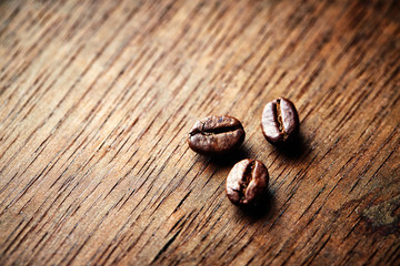Dark Coffee Beans on Wooden Surface