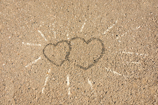Heart painted on asphalt