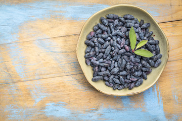 bowl of fresh honeysuckle berry