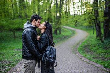 Fototapeta premium man and woman walking by park