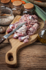 Preparing to cook raw chicken stomach.