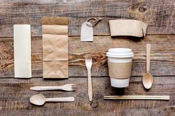 paper bags and plastic cup for take away set top view space for text