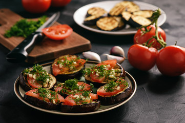 Appetizers- grilled eggplants with tomatoes, garlic and dill.