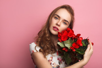 Sensual model posing with flower pot