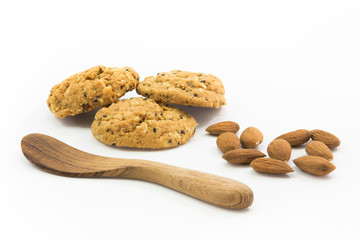 homemade cookie chocolate muesli and almond with wooden spoon.