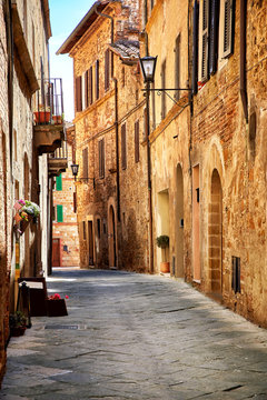 Narrow town street in Pienza, Italy