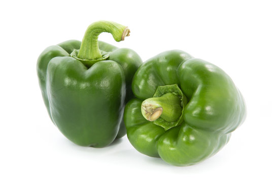 Green capsicum or sweet pepper isolated on white background