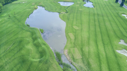 Road among fields and lakes