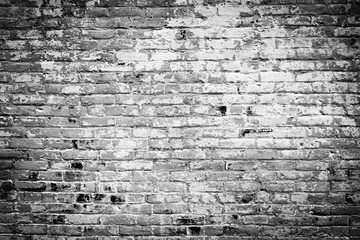Old brick wall background. Black and white grunge texture.