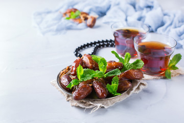 Ramadan ramazan kareem. Traditional arabic tea with mint and dates