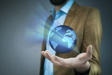 businessman hand global planet in screen
