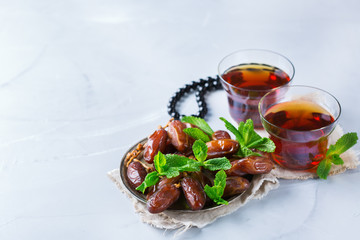 Ramadan ramazan kareem. Traditional arabic tea with mint and dates