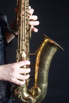 Saxophone Player Saxophonist playing jazz music. Sax player