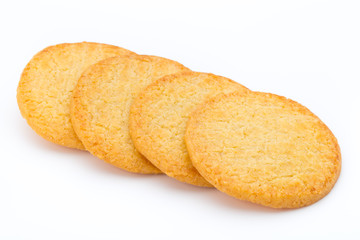 Stacked short pastry cookies isolated on white background.