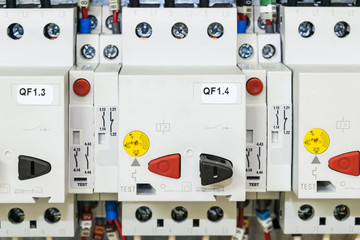 On the mounting panel of the electrical Cabinet is located a few circuit breakers motor protection. Also connected to additional contacts.