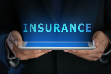 Businessman with tablet, closeup