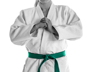 Young sporty woman in kimono on white background, closeup