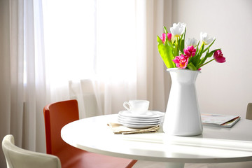 Modern living room with table and chairs