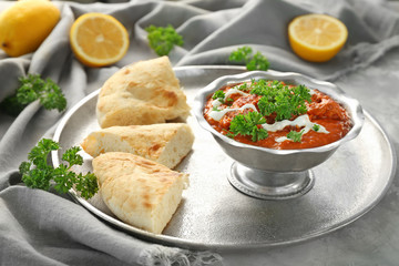 Delicious Murgh Makhani in metalic bowl