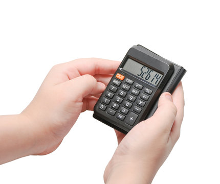 Calculator with numbers on display in the hands