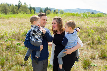 Family Portrait of Four Outdoors