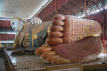 Kyauk Hhat Gyi the beautiful eyes and big reclining Buddha in Yangon township of Myanmar.