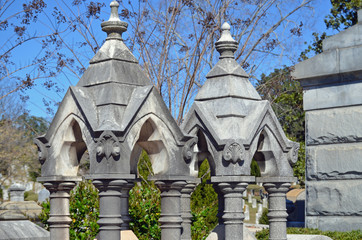 Gothic style columns on a memorial in a cemetery