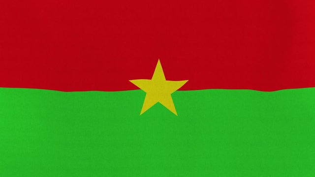Loopable: Flag of Burkina Faso...Burkinabe official flag gently waving in the wind. Highly detailed fabric texture for 4K resolution. 15 seconds loop.